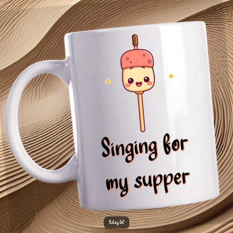 Funny mug depicting a satay skewer holding its own stick like a microphone, ready to sing on stage with comedic flair.