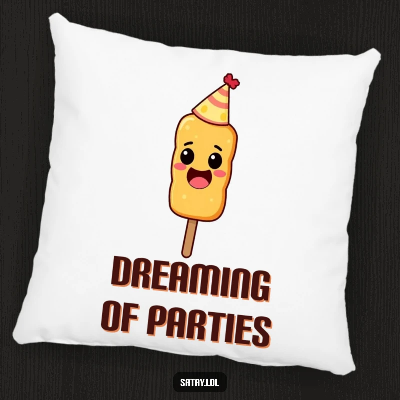 Funny decorative pillow showing an excited satay skewer wearing a small party hat.
