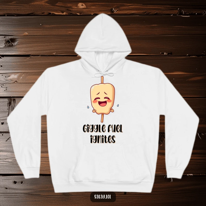 Funny hoodie with a satay skewer character giggling uncontrollably, a happy tear falling; soft, warm, and hilarious.