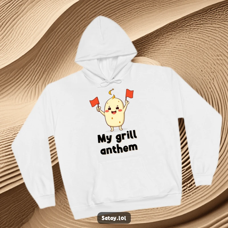 Funny Satay Character Hoodie: A jubilant satay enthusiastically waves a miniature grill flag, perfect for cozy and humorous celebrations.