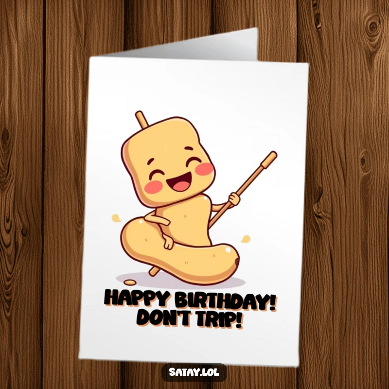 Funny Free Printable Birthday Card: Smiling satay skewer character comically slipping on a peanut, a hilarious birthday greeting.