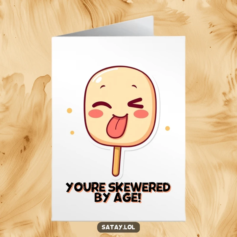 Funny Free Printable Birthday Card: A winking satay skewer character playfully sticks out its char-marked tongue, ready to party.