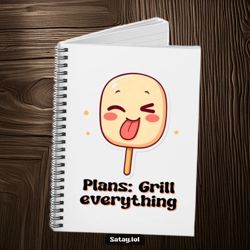 Funny notebook with a winking satay skewer character sticking out its char-marked tongue, perfect for jotting down funny thoughts.